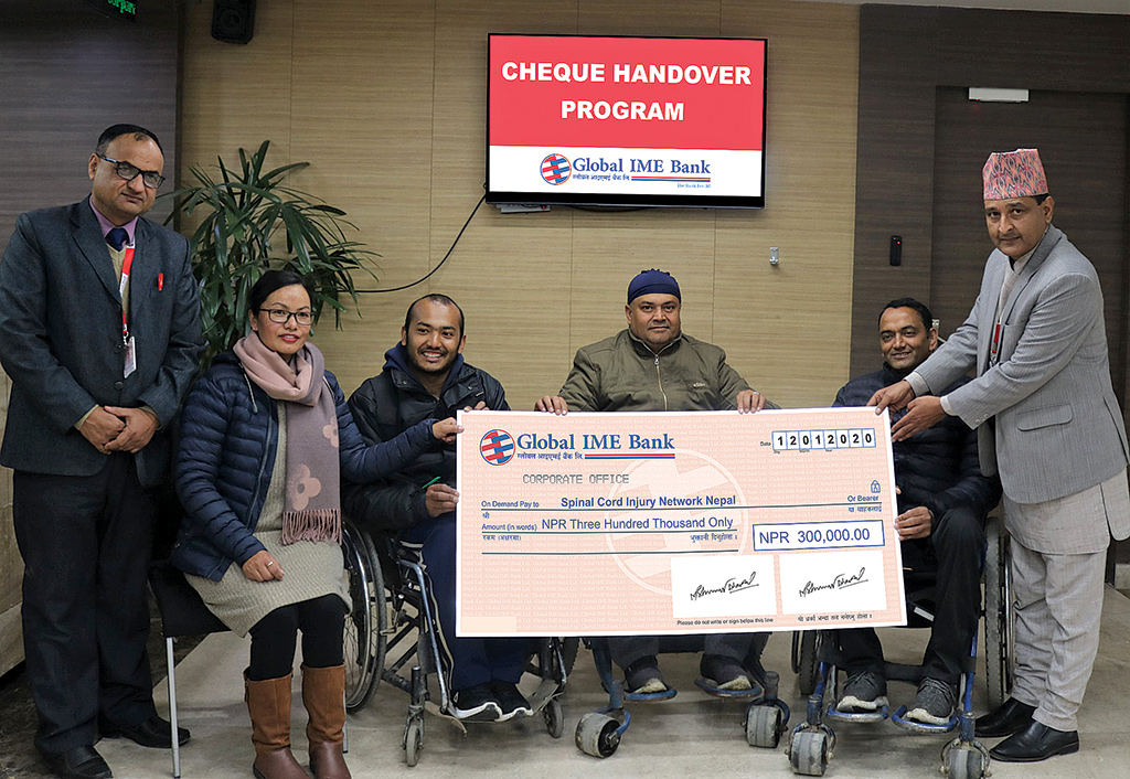 Global IME Bank provides financial aid of Rs 3 lakhs to Spinal Cord Injury Network Nepal