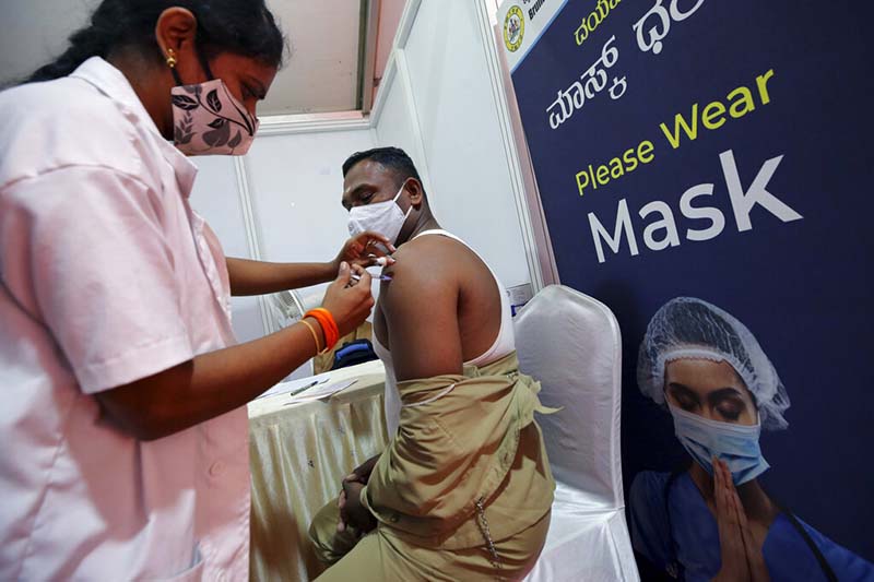 India starts booster shots for vulnerable amid omicron surge
