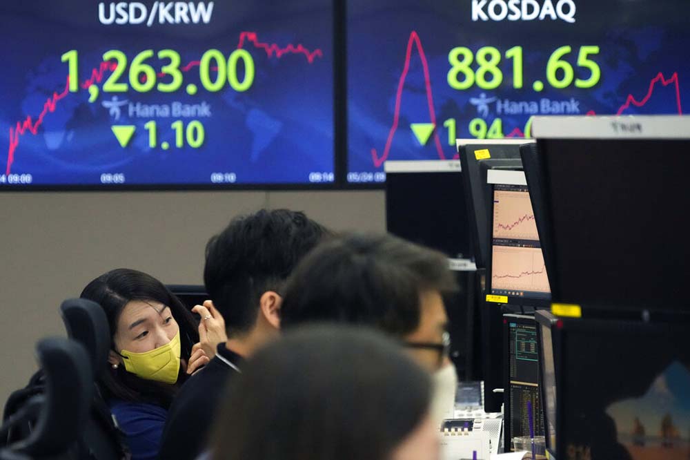 Asia shares trading lower as inflation worries cloud outlook