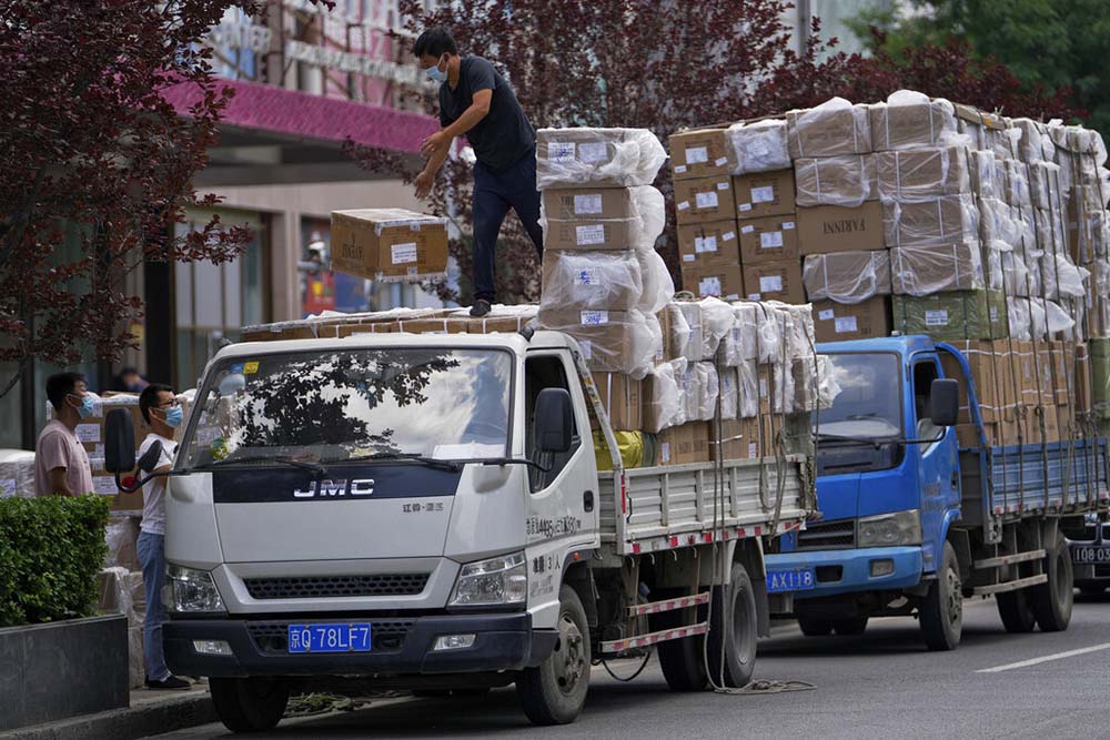 China’s factory activity rebounds as anti-virus curbs ease