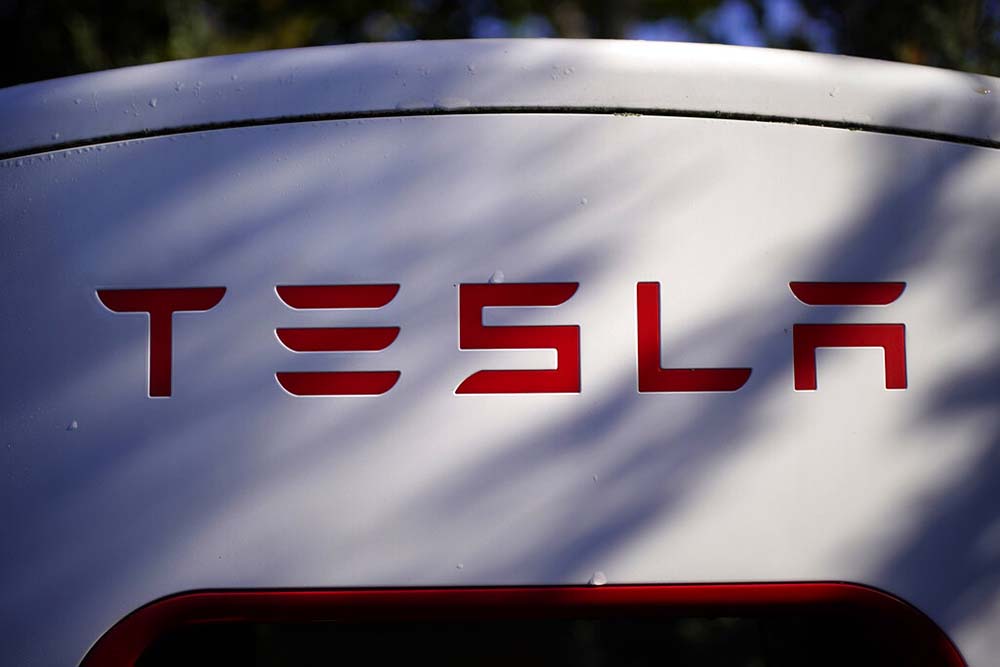 Tesla 3Q profit more than doubles from a year ago to $3.29B