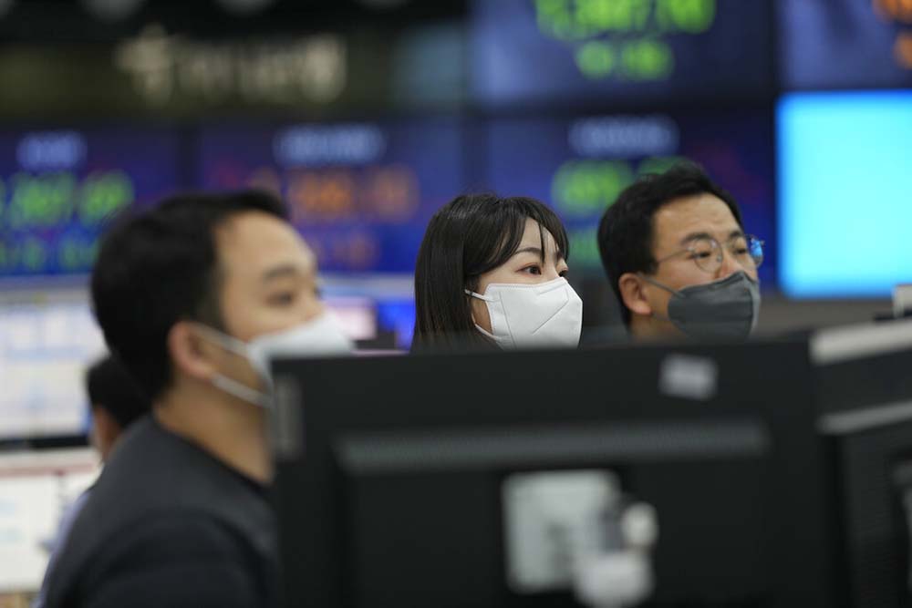 Asian shares extend losses after Wall Street decline