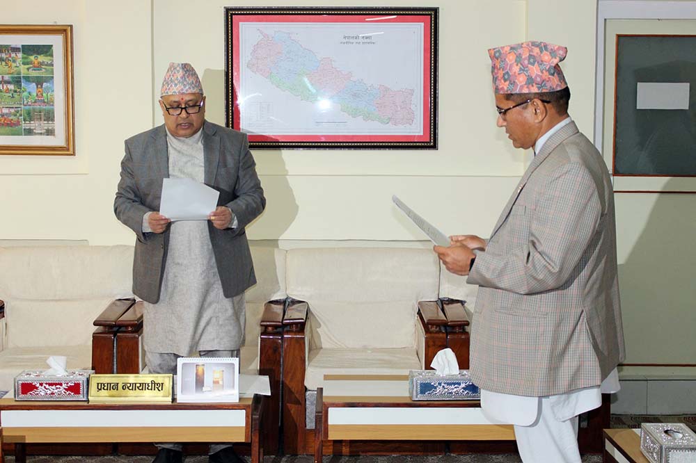 Finance Secretary Raya sworn in as NRB Board member