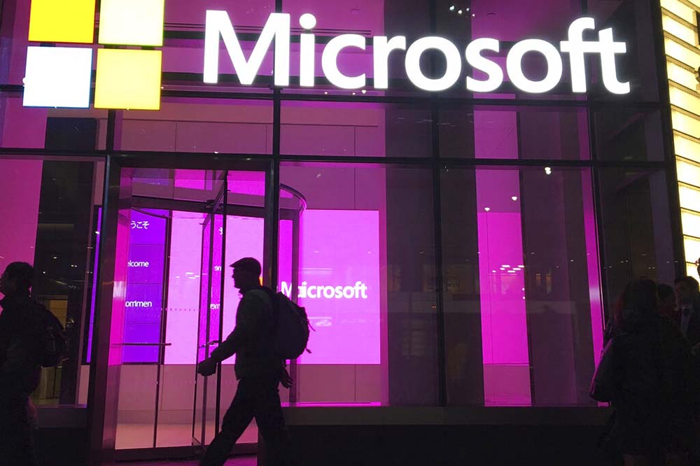 Microsoft, amid layoffs, says quarterly profit declined 12%