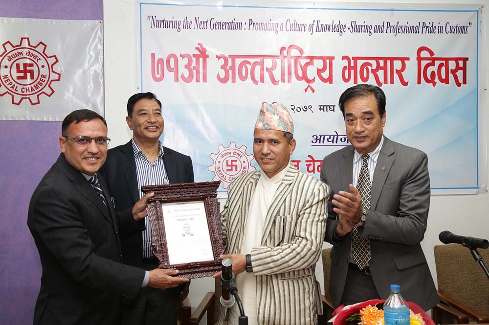 NCC honours Department of Customs Director Mainali