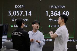 Asian shares are mostly down as Trump’s tariff deadline looms and pressure steps up