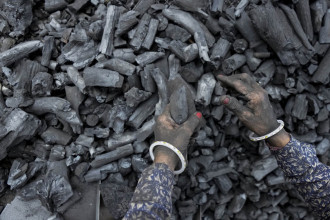 India celebrates clean energy milestone but coal still king
