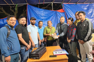 Nepal Nightlife Entertainment Business Association donates cash, food to Rasuwa flood victims