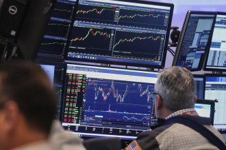 Asian shares inch higher as uncertainty over US tariffs persists