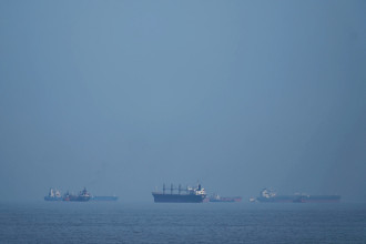 Iran warns against wider war as Trump asks allies to escort ships