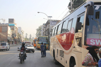 Tourists forced to board buses on busy roads due to lack of dedicated bus park in Kathmandu