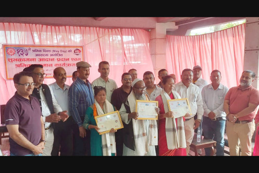CIM honours long-serving workers on 137th International Workers' Day