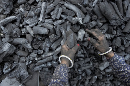 India celebrates clean energy milestone but coal still king