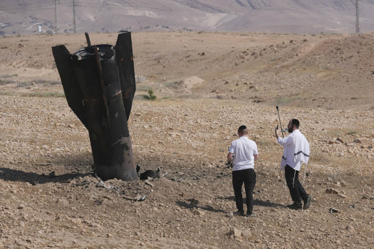 Israel and Iran trade strikes, threatening to drag region back to war