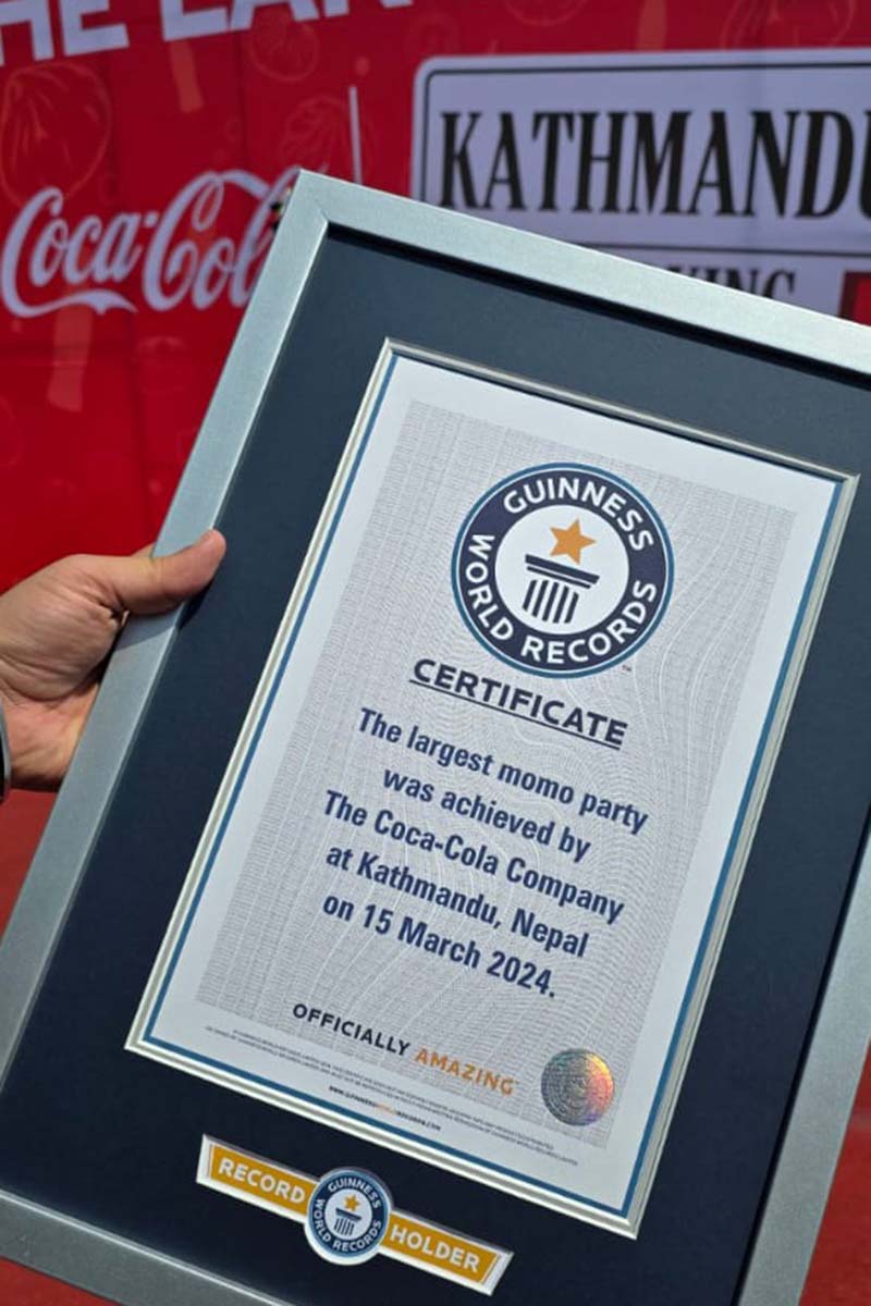 Coca-Cola,-Guinness-World-Record,-The-Largest-Momo-Party-(1)-1710658797.jpg