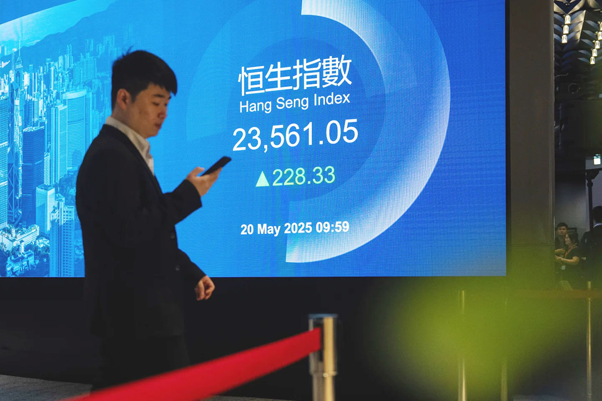 World shares advance after China cuts interest rates to boost economy