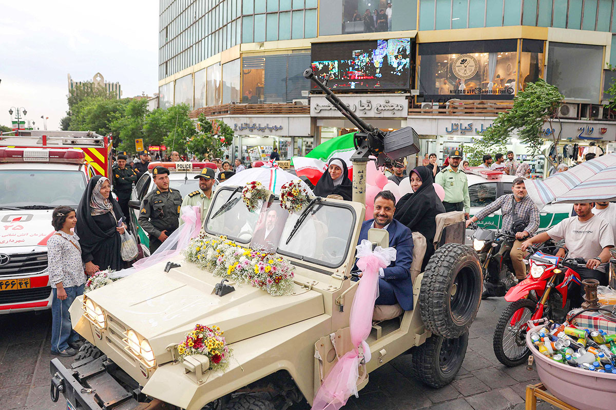 Iran stages mass weddings for couples ready for war 'sacrifice'