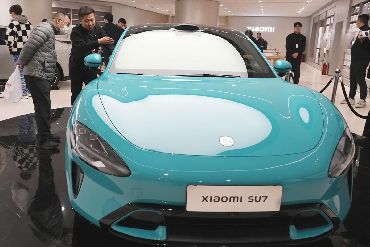 Xiaomi says electric cars and AI now profitable